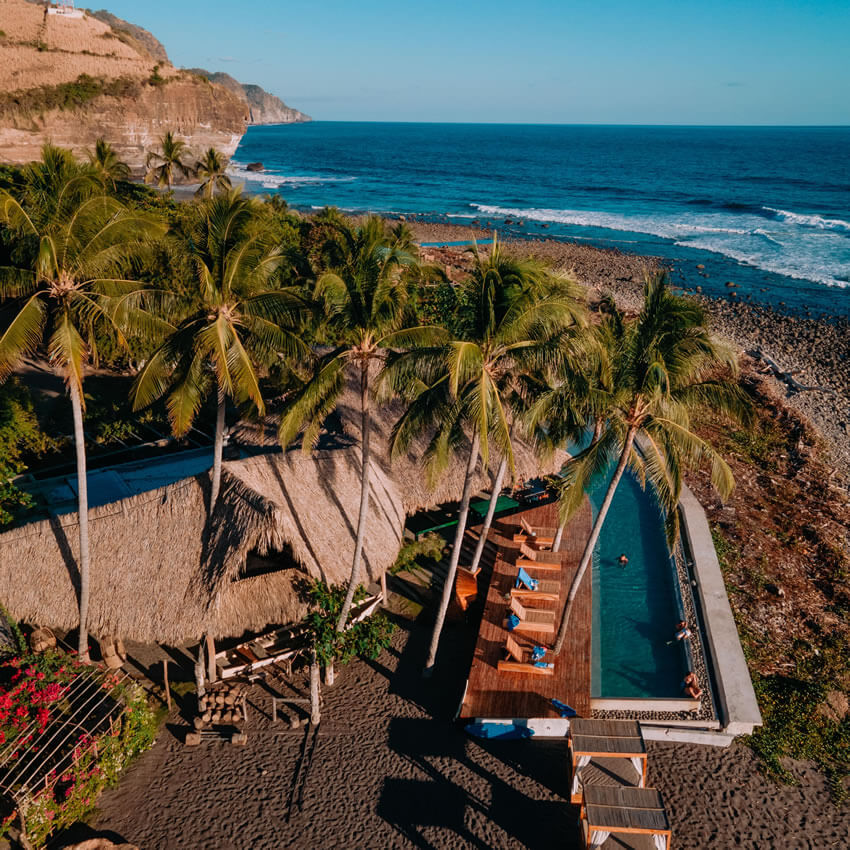 Aerial View of womens retreat beachside pool and accommodations